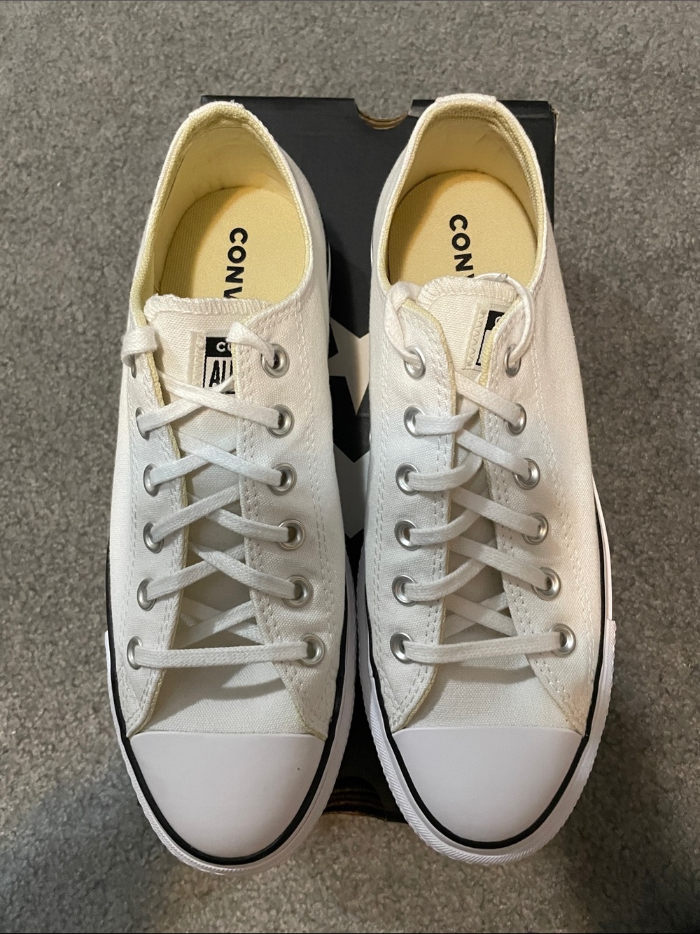 Converse Low Top Sneakers in White with Black Trim